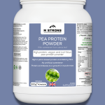 Pea protein powder in a scoop surrounded by natural ingredients: green tea leaves, acai berries, and spirulina powder